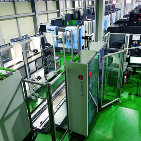 Vue d'ensemble de la cellule de production équipée d'un EROWA Robot Dynamic et de machines-outils